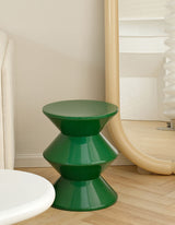 Stylish green dressing table stool with a modern design, perfect for any bedroom decor
