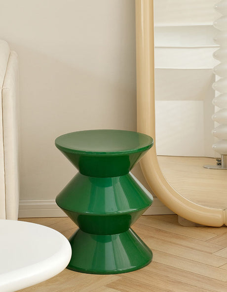 Stylish green dressing table stool with a modern design, perfect for any bedroom decor