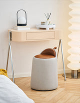 Stylish Le Di Vita Dressing Table Stool in grey with brown leather seat next to a modern dressing table