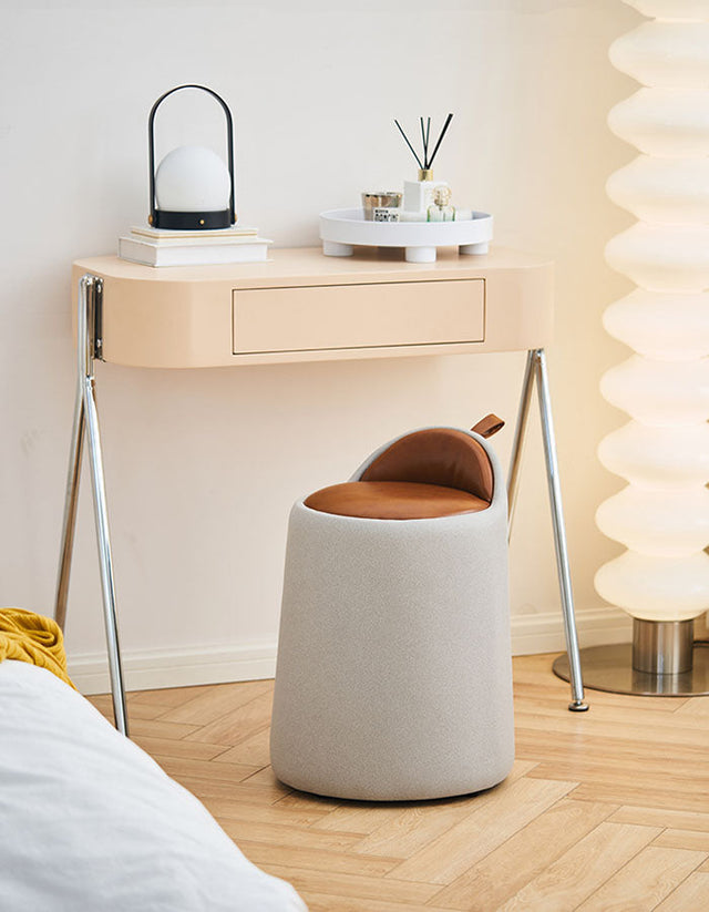 Stylish Le Di Vita Dressing Table Stool in grey with brown leather seat next to a modern dressing table