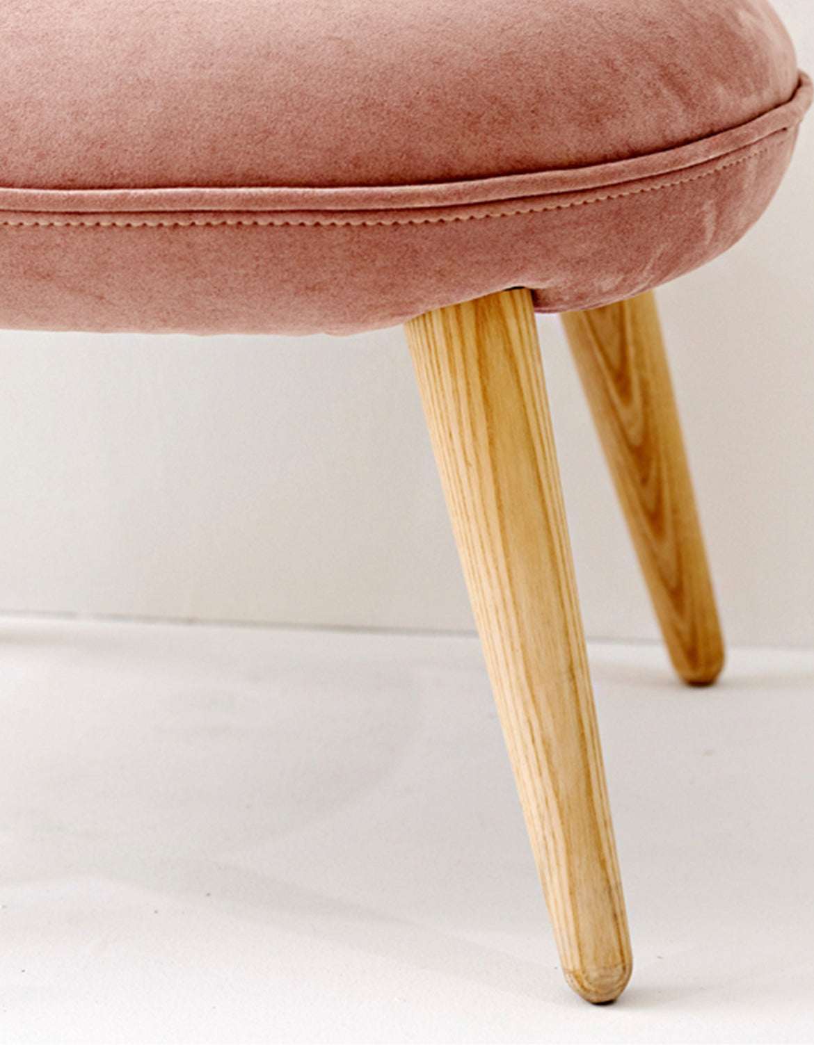 Stylish pink Dressing Table Stool with wooden legs, perfect for modern home decor