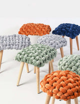 Colourful Le Di Vita Dressing Table Stool with a woven design and wooden legs for stylish decor