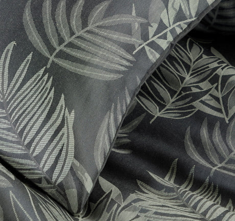 Olivia Rocco Duvet Cover Sets featuring a stylish leaf pattern in muted tones