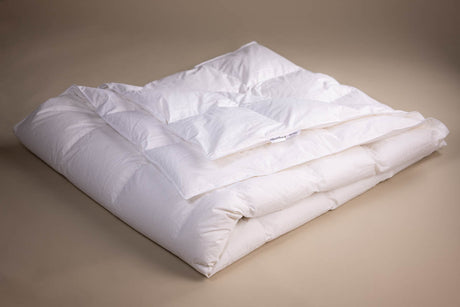 PillowPillow luxurious white duvet, featuring a soft and fluffy design for ultimate comfort