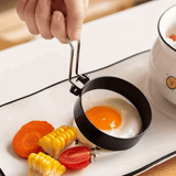 Orsina Egg Rings for perfectly shaped fried eggs, includes a handle and suitable for breakfast meals