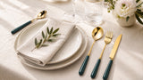 KitchBoom Cutlery Set with Gold Finish and Green Handles on a Stylish Table Setting