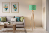 Stylish Shadow Bright lampshade on a tripod floor lamp in a modern living room setting