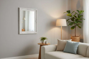 Orsina Wall Mirror in a decorative frame, enhancing the living room's modern aesthetic
