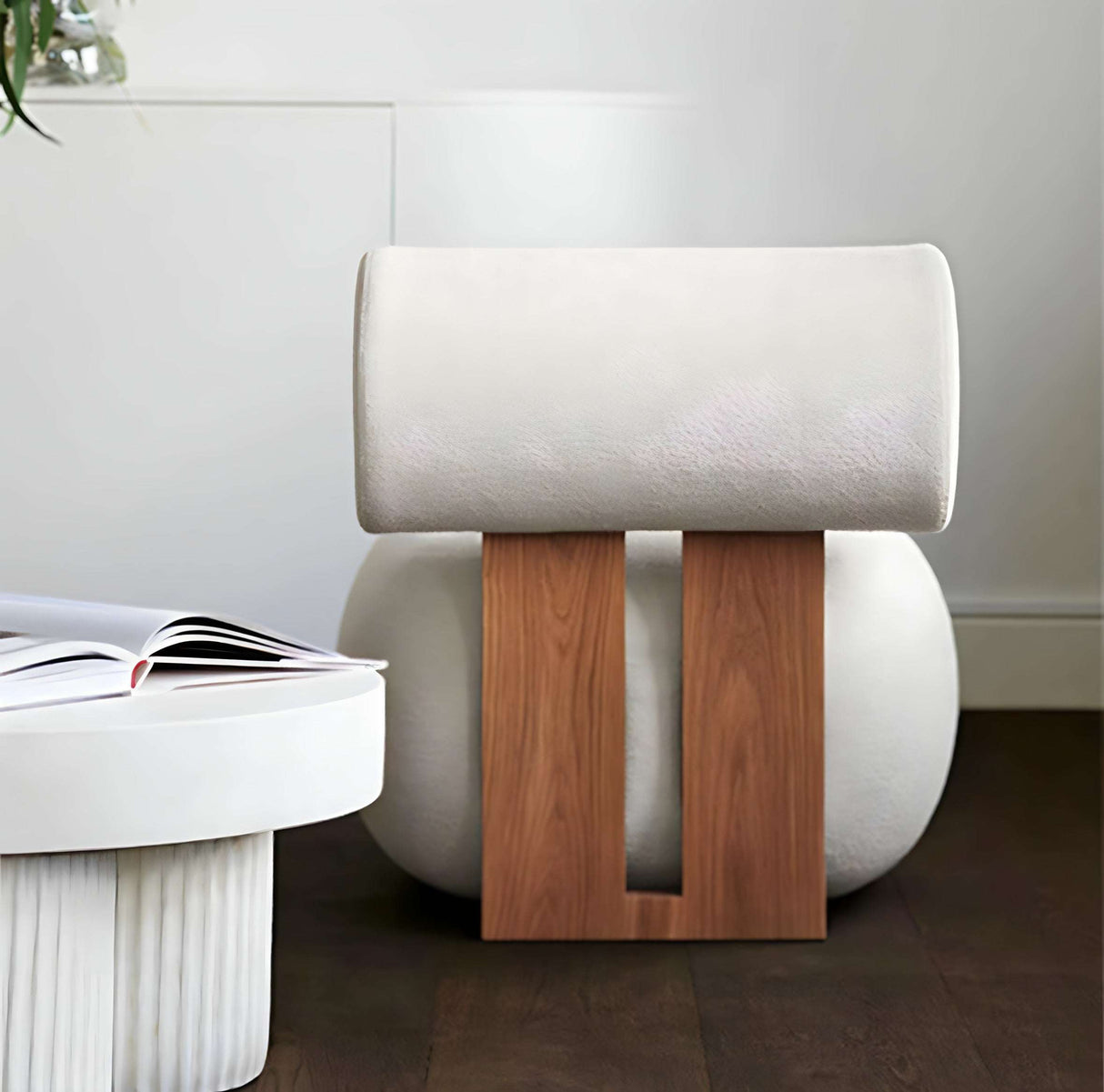 Stylish Nisu Home Chair with a soft white upholstery and wooden base, perfect for modern interiors