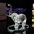 Elegant glass Elephant Ornament with intricate detailing on a decorative base