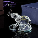 Elegant glass Elephant Ornament featuring vibrant colours and a detailed design on a reflective base
