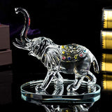Elegant glass Elephant Ornament with colourful detailing on a mirrored base for decorative appeal