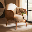 Stylish Fabric and Cane Chair from Orsina with a cosy blanket draped over it, perfect for any living space