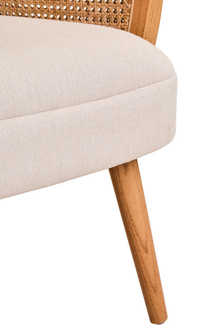 Orsina Fabric and Cane Chair with a soft beige upholstery and stylish wooden legs
