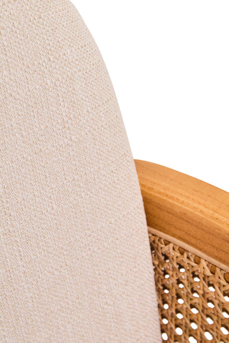 Close-up of Orsina Fabric and Cane Chair showcasing the textured fabric and natural cane detailing