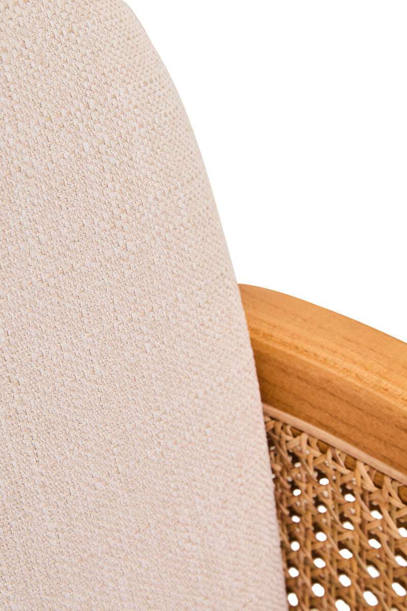 Close-up of Orsina Fabric and Cane Chair showcasing the textured fabric and natural cane detailing
