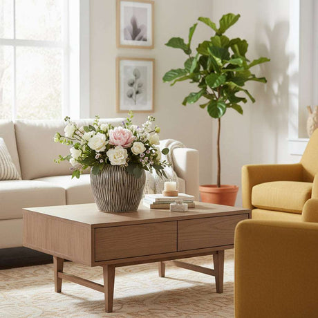 Fleck Vase from Shades 4 Seasons filled with fresh flowers on a wooden coffee table in a bright living room