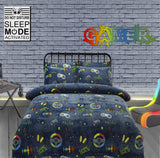 Olivia Rocco Fleece Duvet Set featuring a playful gamer design with video game controllers and vibrant colours