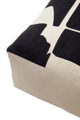 Orsina Floor Cushion with a stylish black and cream design, ideal for home decor and comfort