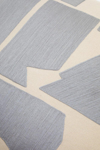 Orsina Floor Cushion with a textured grey design, perfect for stylish interior decor and comfortable seating