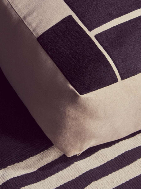 Orsina Floor Cushion with a stylish geometric pattern in neutral tones for modern decor