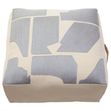 Orsina Floor Cushion with a modern geometric design in grey and cream for stylish home decor