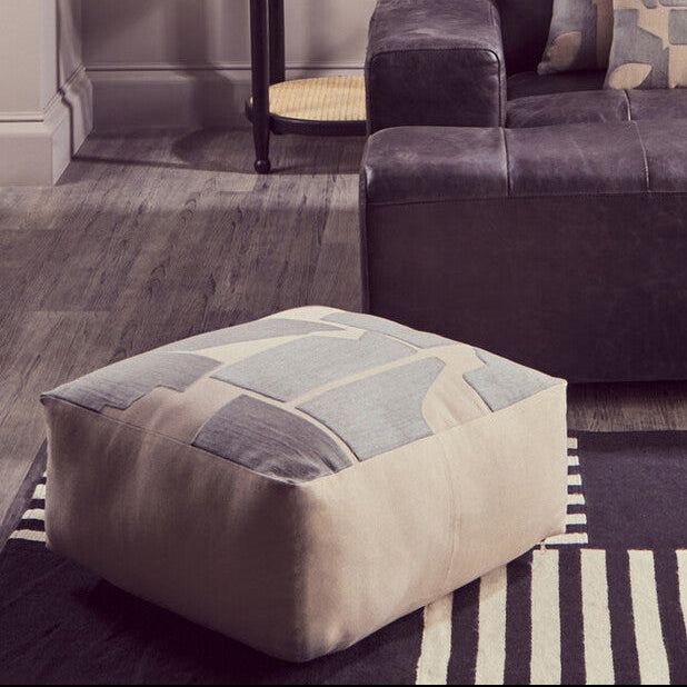 Orsina Floor Cushion in a geometric design, ideal for stylish lounging and floor seating.