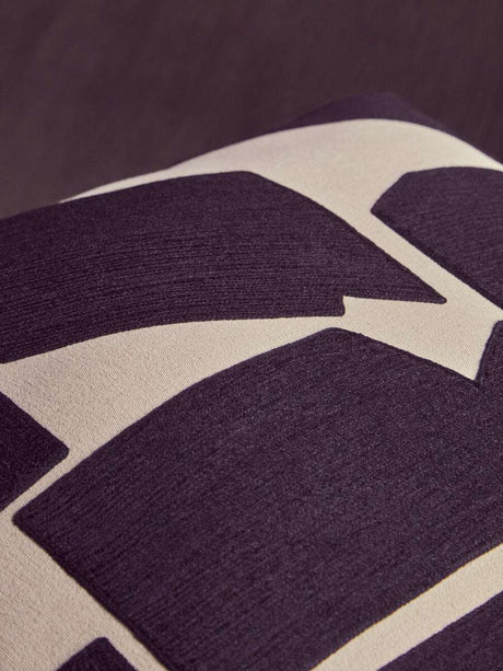 Orsina Floor Cushion with Modern Abstract Design in Dark Tones for Stylish Home Decor