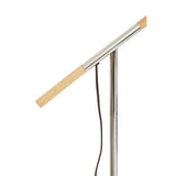 Sleek Orsina Floor Lamp with a modern design featuring a wooden arm and shiny chrome base