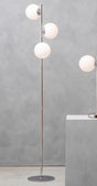 Orsina Floor Lamp with four globes on a sleek chrome stand for modern illumination