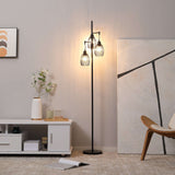 Wise Galleria Floor Lamp with three glass shades providing warm ambient light for living spaces