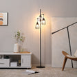 Wise Galleria Floor Lamp with three glass shades providing warm ambient light for living spaces
