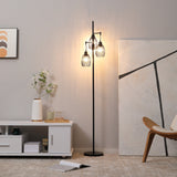 Wise Galleria Floor Lamp with three glass shades providing warm ambient light for living spaces
