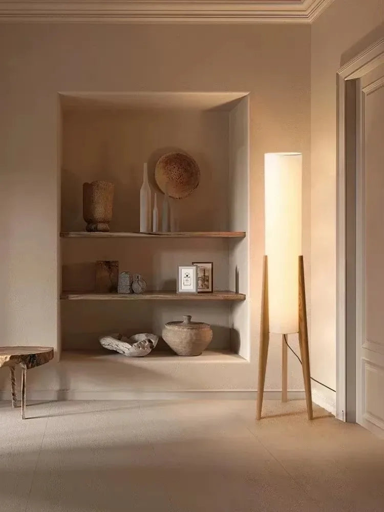 Nisu Home Floor Lamp in a minimalist setting with soft ambient light and wooden accents
