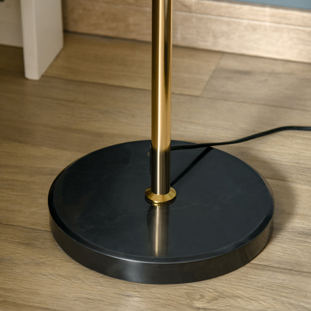 Modern Floor Lamp base with a sleek black finish and gold accents for elegant lighting