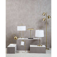 Orsina Floor Lamp with a modern design in a stylish setting showcasing various lamp styles