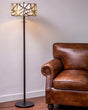 Orsina Floor Lamp with unique patterned shade, perfect for illuminating living spaces