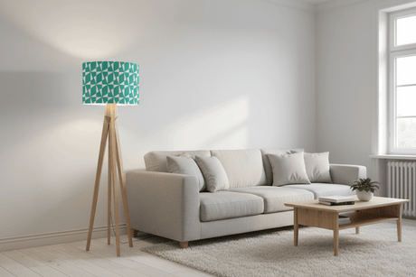 Shadow bright lampshade in geometric teal design above a modern floor lamp in a stylish living room