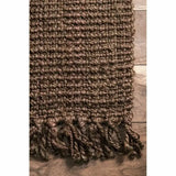 Textured brown Nisu Home Floor Rug with decorative fringes for a cosy home aesthetic