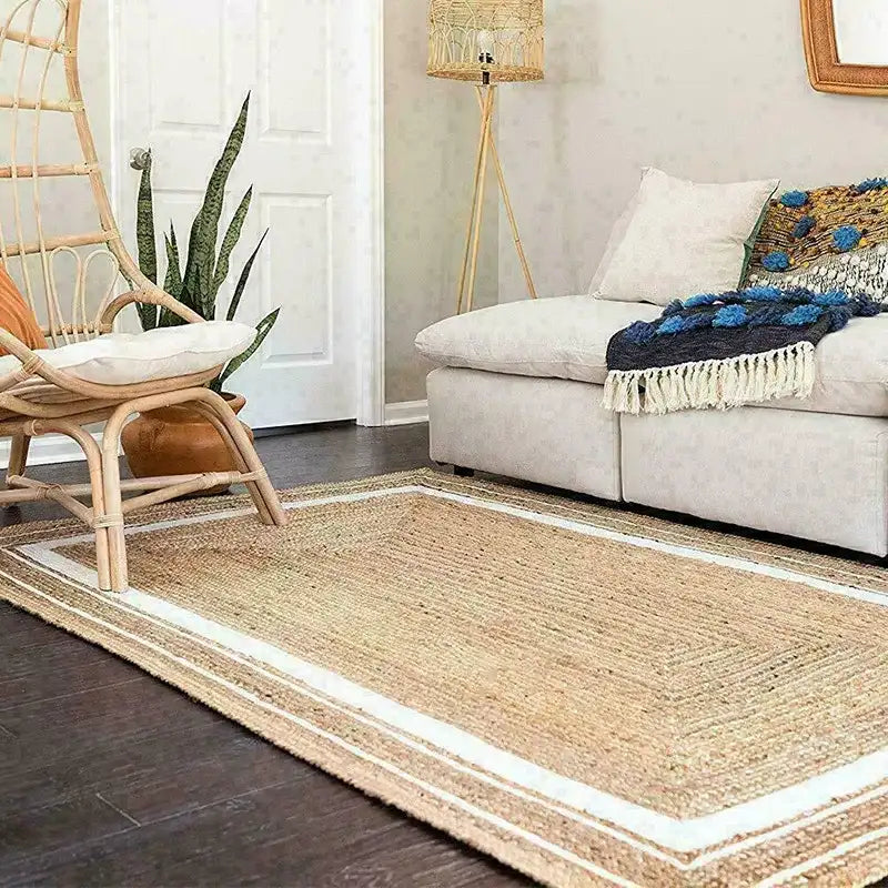 Natural Jute Floor Rug in a stylish living room setting with a sofa and decorative chair