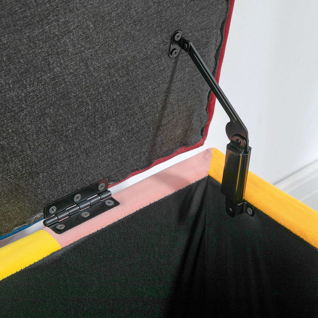 Interior view of a Wise Galleria Footstool Box with soft lining and sturdy hinges for easy access