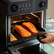 Fridja Digital Air Fryer with Salmon Fillets Cooking Inside the Oven