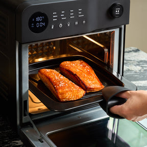 Fridja Digital Air Fryer with Salmon Fillets Cooking Inside the Oven