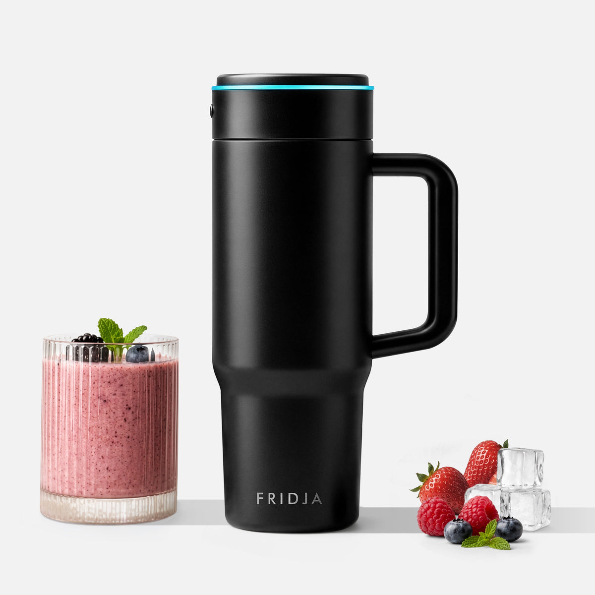 Fridja Portable Blender in Black with a Smoothie and Fresh Berries for Healthy Drinks on the Go