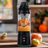 Fridja Portable Blender with chopped fruits and ice ready for smoothies in a stylish kitchen setting
