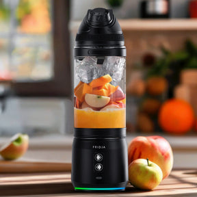 Fridja Portable Blender with chopped fruits and ice ready for smoothies in a stylish kitchen setting