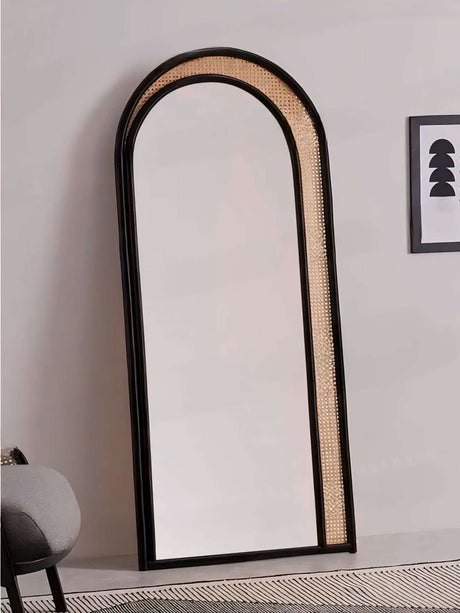 Stylish Nisu Home Mirror with an arched design and natural cane detailing for modern interiors