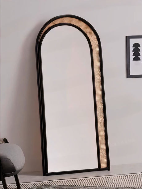Stylish Nisu Home Mirror with an arched design and natural cane detailing for modern interiors