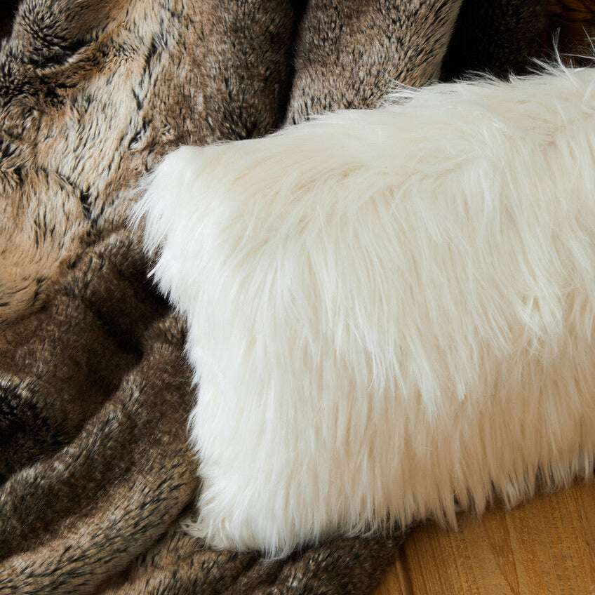 Orsina Fur Cushion in soft white texture, perfect for adding warmth to any living space