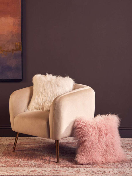 Cozy Fur Cushions in White and Pink on a Modern Chair for Stylish Home Decor